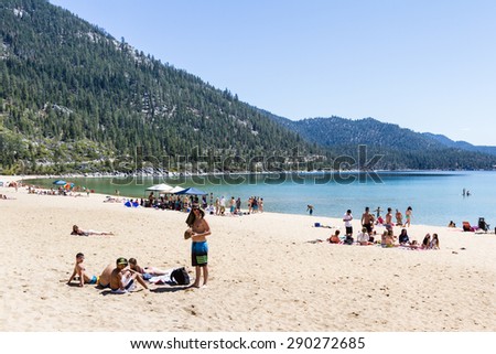 Lake Tahoe, Nevada - April 28 : Spring Break, College students enjoying a day at the beach, April 28 2015 Lake Tahoe, Nevada.
