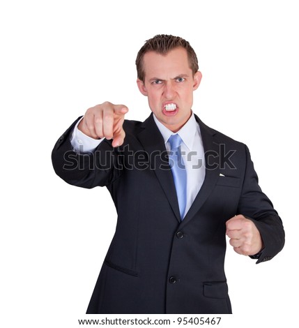 angry business man pointing and making a fist
