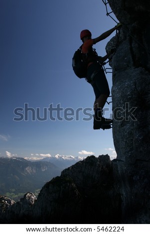 Extreme sport - silhouette of a climber