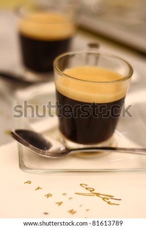 Double espresso cups, closeup in a cafe shop
