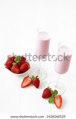 Similar – Image, Stock Photo Strawberry smoothie. Two glasses of berry slush. Summer cold drink