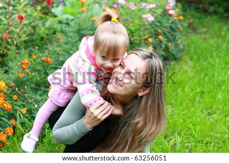 Mom and daughter in the garden