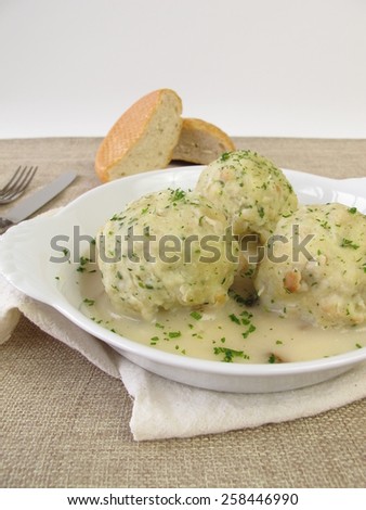 Bread dumplings with mushroom sauce