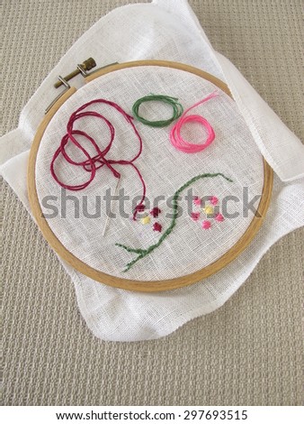 Embroidery with flower tendril