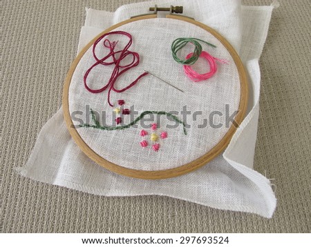 Embroidery with flower tendril