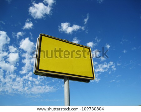 (City-) Sign with copyspace with interesting sky and clouds 1 German city sign - name removed,  blank sign for own text