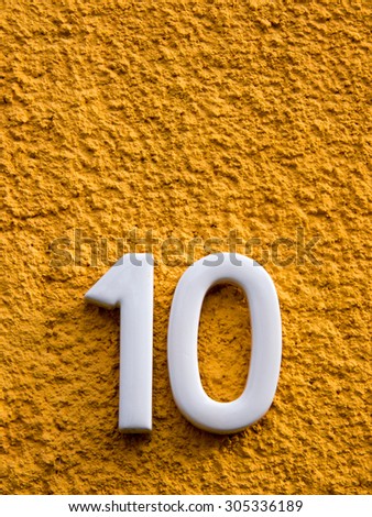 number ten on a house wall