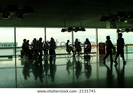 silhouettes in airport terminal,having coffee and chatting,see my gallery for more