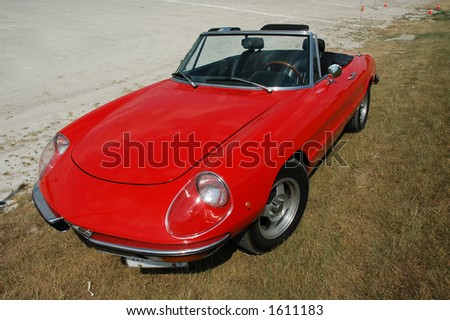 Red Alfa Romeo convertible sports car