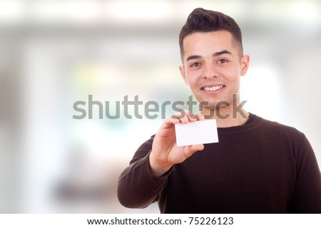 Young man showing card
