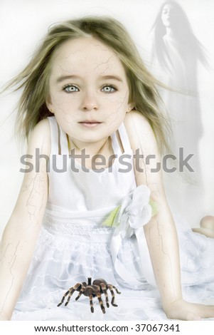 young vampire girl playing with spider