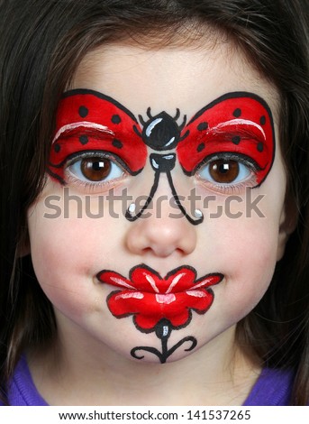 Pretty Girl With Face Painting Of A Ladybug And Red Flower. Stock Photo ...