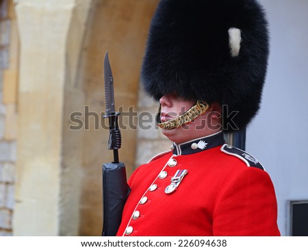 WINDSOR - OCT 15 :Royal Guard on duty in Windsor Castle, one of the official residences of the British Royal Family, Windsor, England in October 15, 2014.