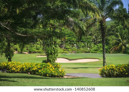Scenic Green and bunker at 8th hole at Green Valley/St. Andrews golf course near Pattaya, Thailand