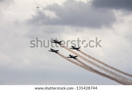 TEL NOF, ISRAEL -APRIL 16: Four army training airplanes performing an exhibition exercise during the Israeli Independence day show on April 16, 2013 in Tel Nof, Israel.
