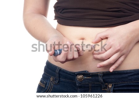 Diabetes patient gets an insulin injection in abdomen area over white background.
