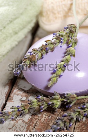 Spa set - fresh lavender and organic lavender soap over old wooden tray. best suited for relaxing and health commercials