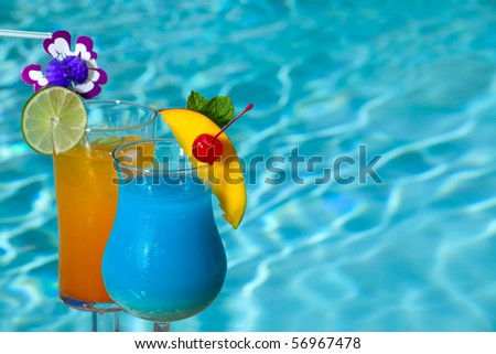 Blue Hawaiian and Mai Tai cocktails on swimming pool side