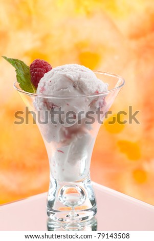 Closeup of delicious Fruit Ice Cream with fresh raspberries.