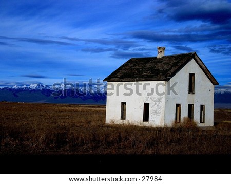 Old house on an open range.