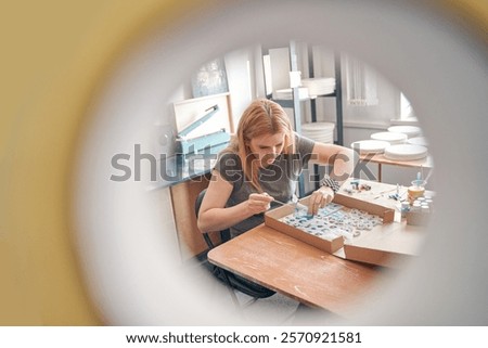 Similar – Image, Stock Photo View through a circular recess of a soccer goal to the opposite goal.