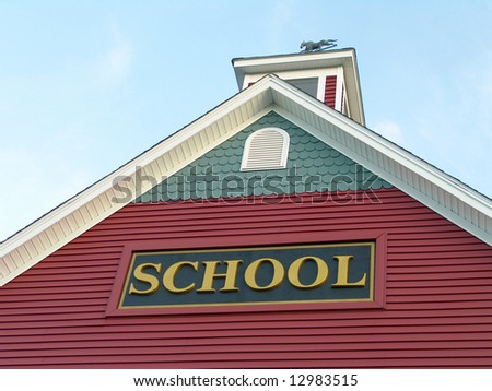 Colonial House School Building Against Blue Sky