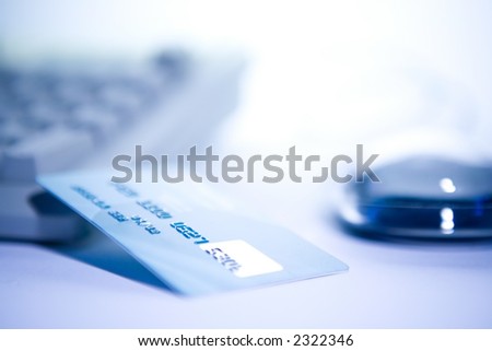 Credit card and computer. Online shopping.