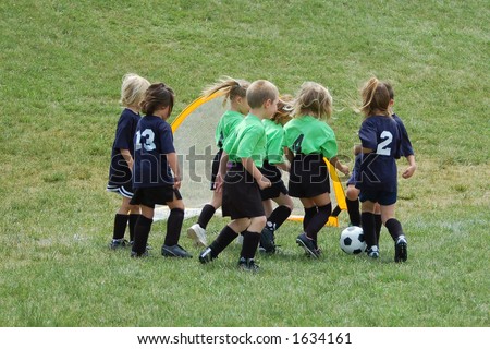 Eight soccer players in a youth league game. Foto stock © 