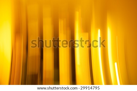 Yellow gold bars blur background stripes.