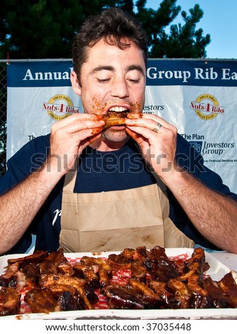 HALIFAX - AUGUST 22: The winner of the rib eating contest at the annual Nuts4Ribs festival, August 22, 2009, in Halifax, Nova Scotia. Nuts4Ribs raises funds and awareness for testicular cancer.