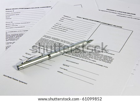 Pen saving on legal documents, contracts shot with the depth of information