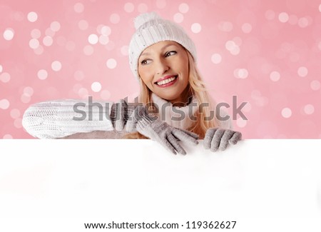 wintertime woman with commercial sign