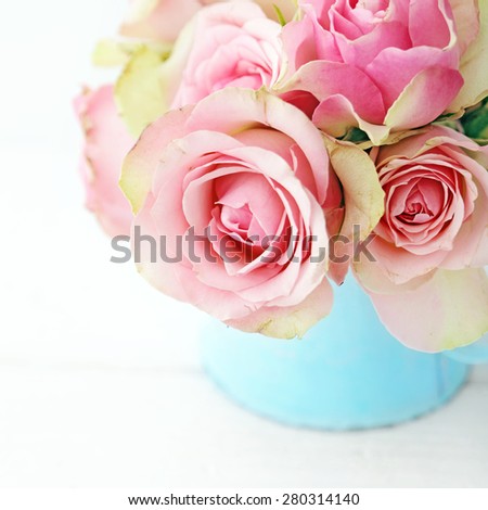 pink rose flowers in a vase. shabby chic colors