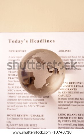 today\'s headlines. global news. newspaper and globe