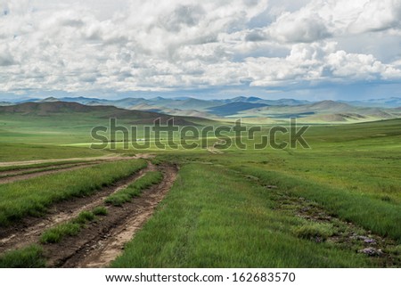 dirt road into the distance, Gobi Desert, summer