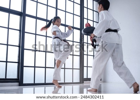 Similar – Image, Stock Photo Little girl attacked by a dog