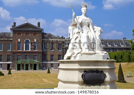 LONDON, UK - JULY 13, 2013: Statue of Queen Victoria situated outside Kensington Palace in London.