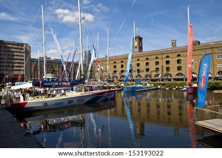 LONDON, UK - AUGUST 29TH 2013: Clippers moored at the historic St Katherine Dock in London on 29th August 2013.