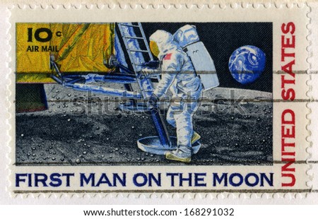 UNITED STATES, CIRCA 1969: A vintage 10 cent US Postal Stamp celebrating the First Moon Landing, circa 1969.