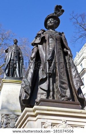 Statues of Elizabeth The Queen Mother and King George IV situated in Carlton Gardens, near The Mall in London.