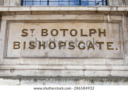 Exterior name plaque on St. Botolph-without-Bishopsgate church in London.