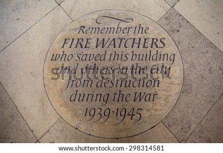 A marker stone in Canterbury Cathedral commemorating the efforts of the Firewatchers during the Second World War who saved the Cathedral from destruction during the Blitz.
