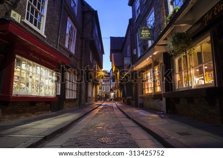 YORK, UK - AUGUST 28TH 2015: A view of the Shambles in York, on 28th August 2015.  It is one of the oldest streets in York with some of the timber-framed buildings dating from the fourteenth century.