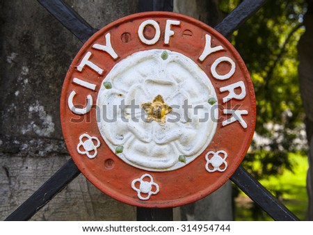 A metal plaque of the crest of the City of York, England.