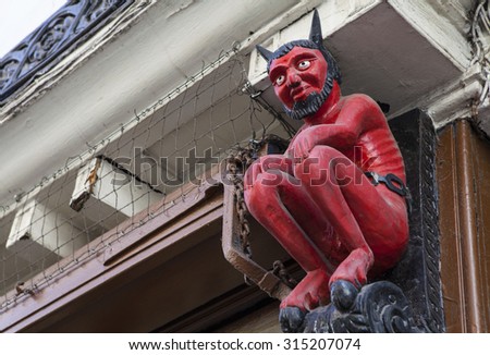 The famous Little Red Devil statue located in Stonegate, York.