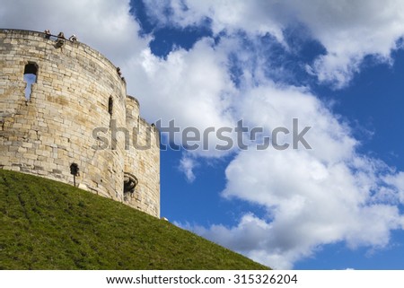 YORK, UK - AUGUST 26TH 2015: A view of the historic Cliffords Tower in York, on 26th August 2015.