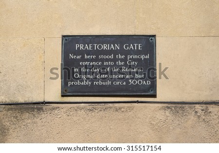 YORK, UK - AUGUST 27TH 2015: A plaque marking the location where the Roman Praetorian Gate once stood, in York on 27th August 2015.