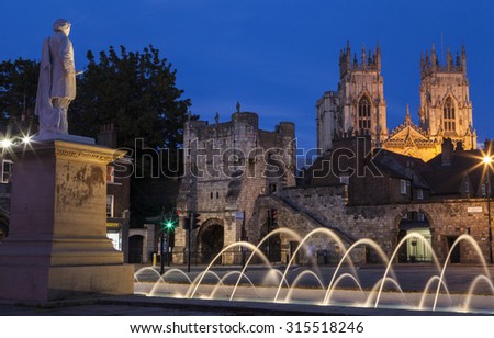 YORK, UK - AUGUST 29TH 2015: An evening view from the York Art Gallery taking in the sights of the William Etty statue, Bootham Bar and the towers of York Minster in York, on 29th August 2015.