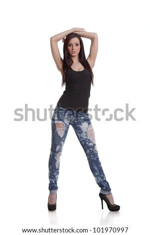 Full length posing girl in jeans and high heels