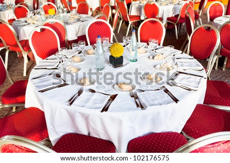 served table at the beginning of official dinner in restaurant
